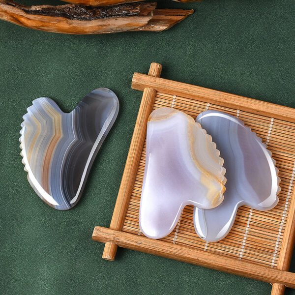 Gua Sha tool with comb teeth