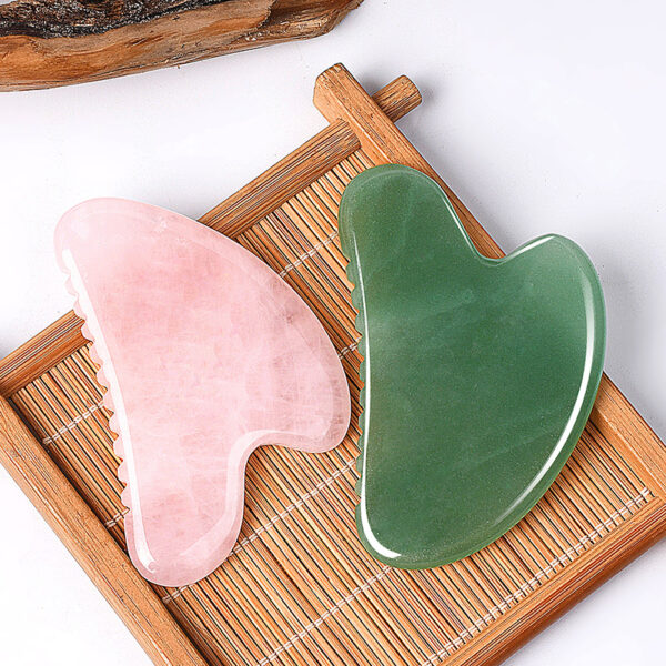 Gua Sha tool with comb teeth